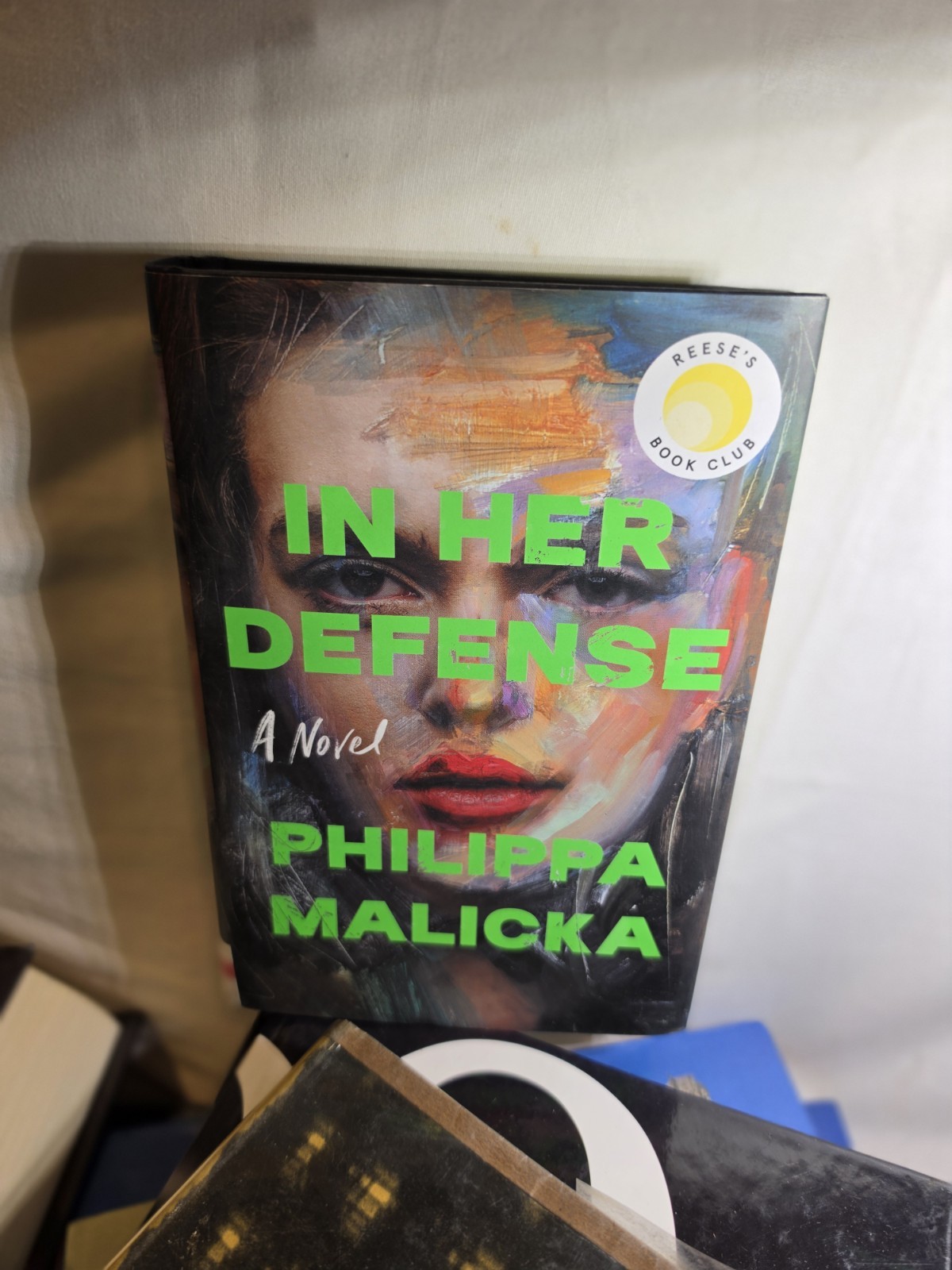 In Her Defense by Philippa Malicka NEW Hardcover/Dust Jacket Reese’s Book Club