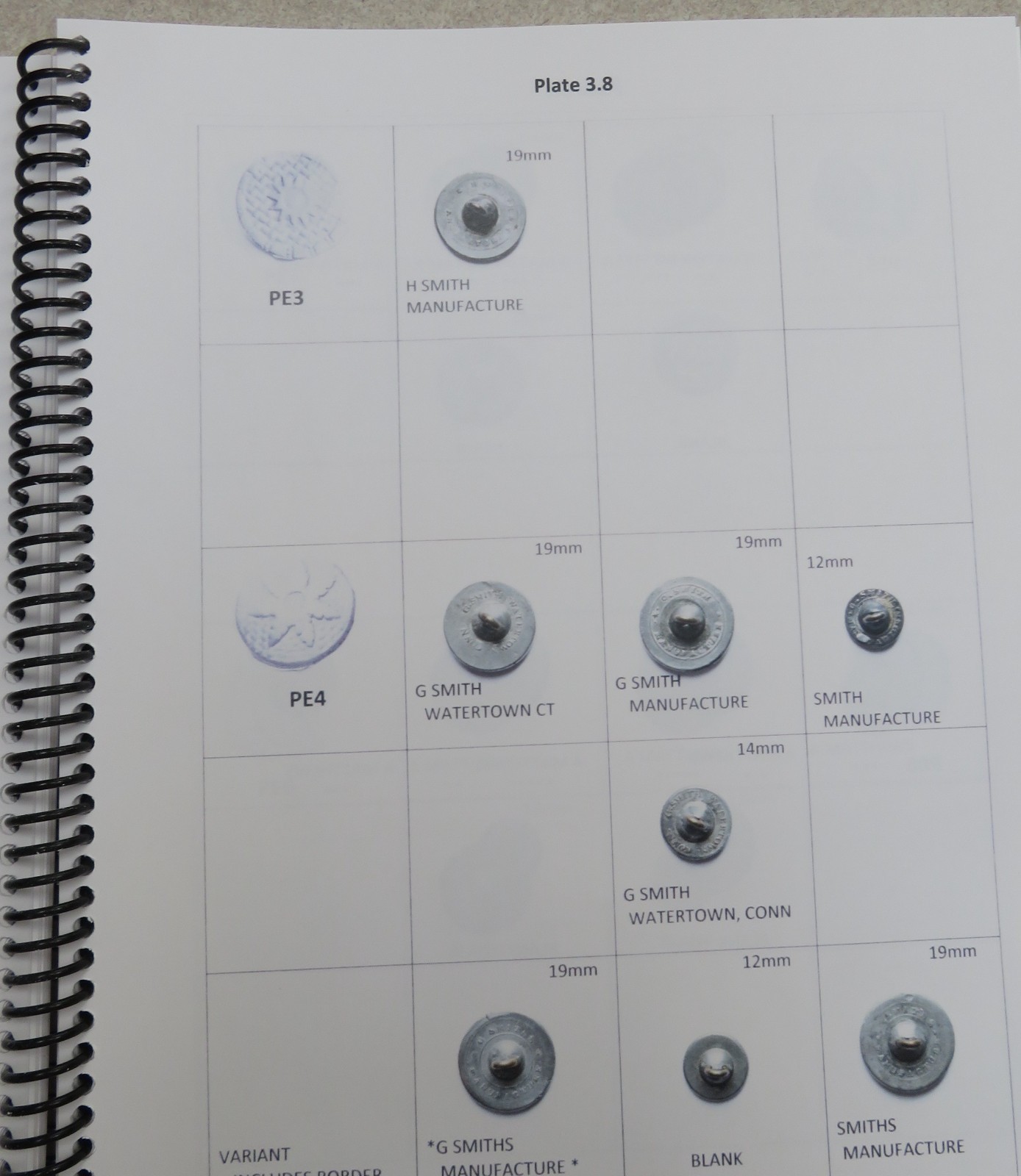 HARD WHITE PEWTER BUTTON BOOK
