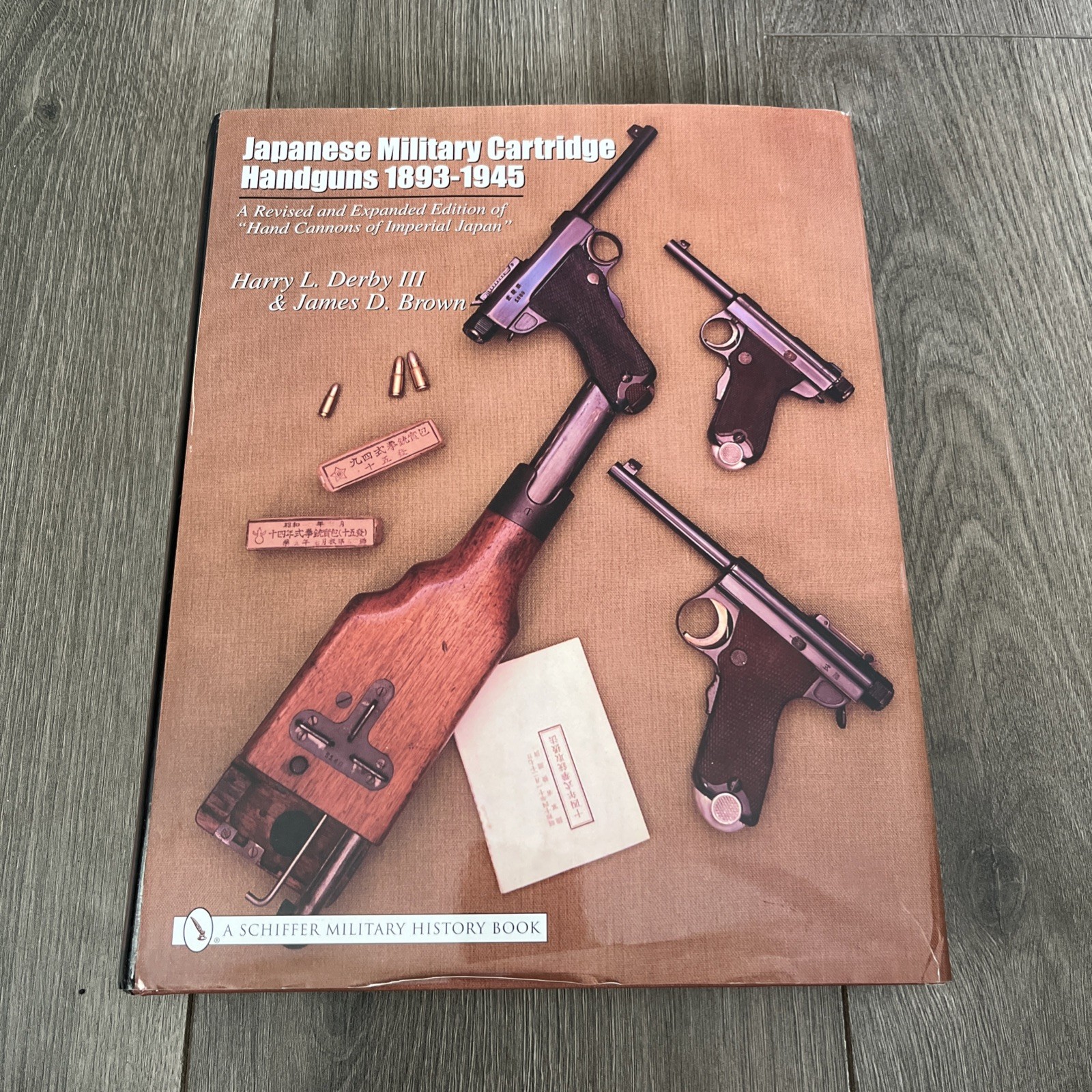 Japanese Military Cartridge Handguns 1893-1945 : A Revised and Expanded Edition