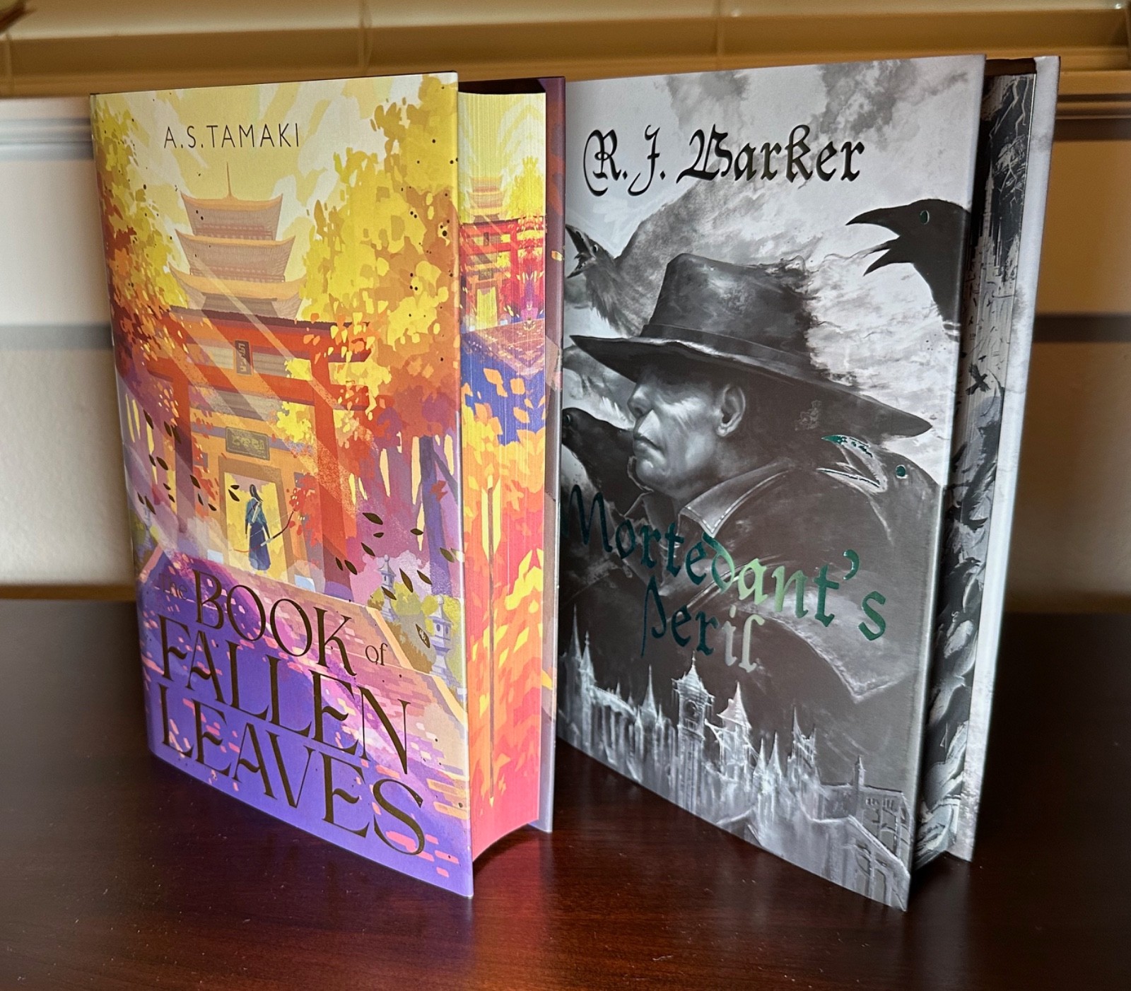 FairyLoot: Book of Fallen Leaves by AS Tamaki & Mortedant’s Peril by RJ Barker