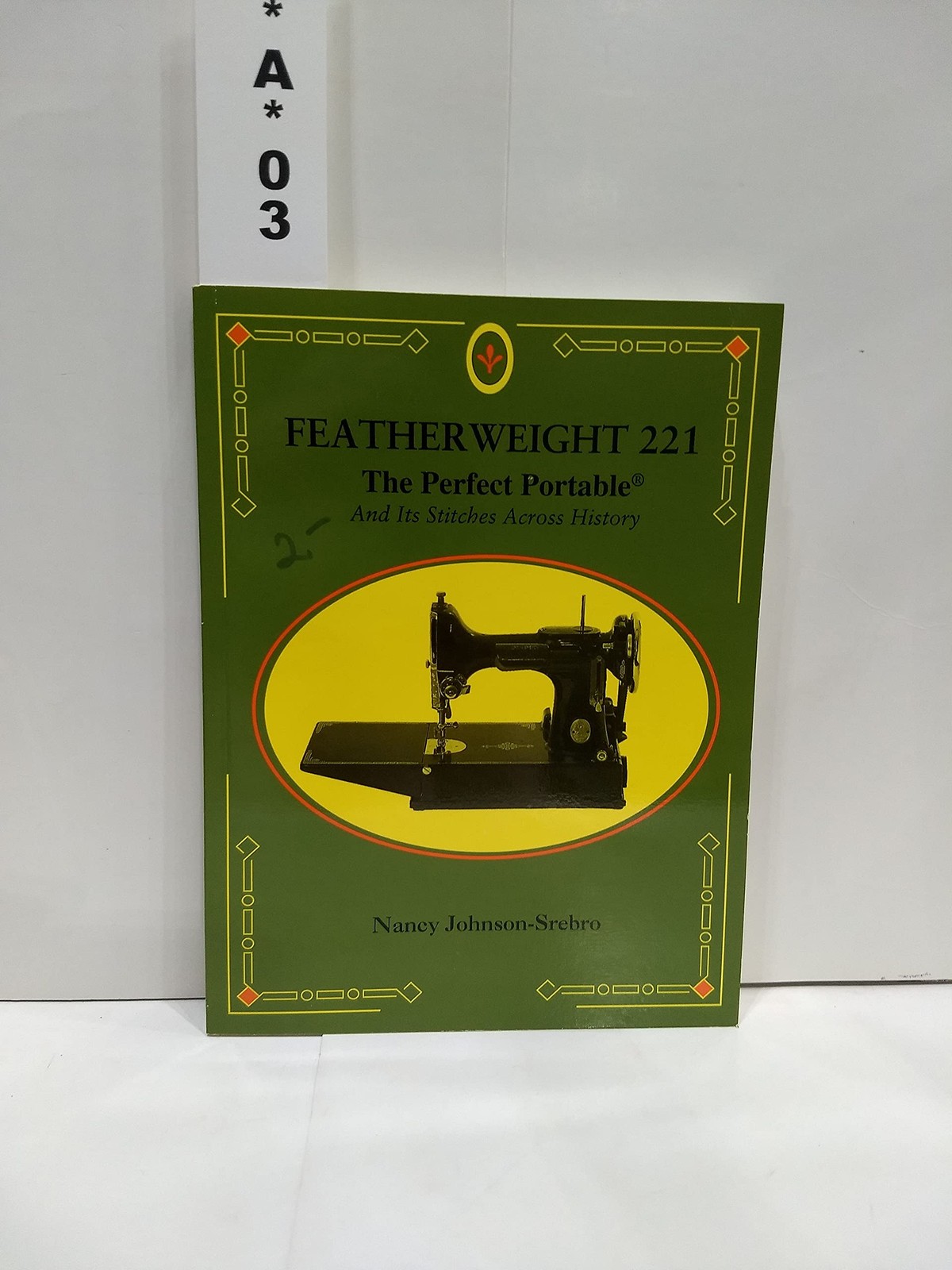 Featherweight 221 : the perfect portable : and its stitches across history