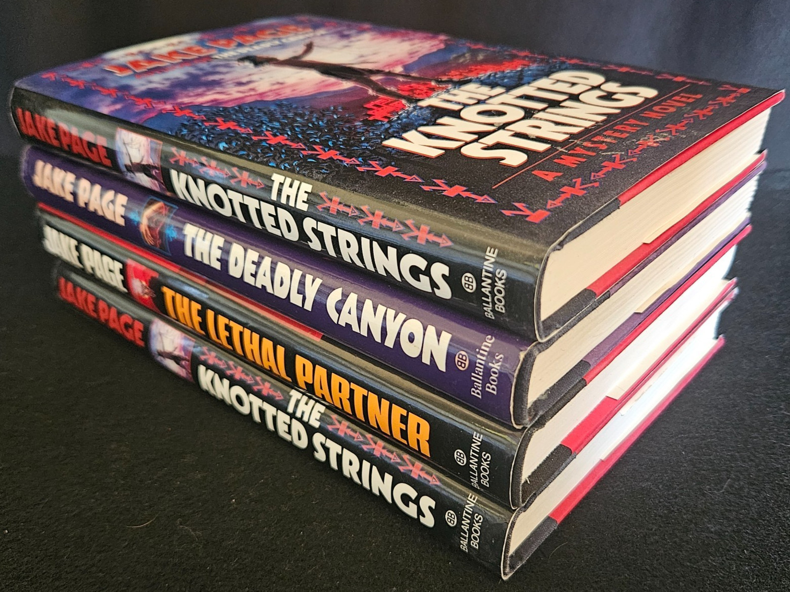 4 HC Jake Page Novels. 1 Knotted Strings is Autographed 1st Printing. All VG!