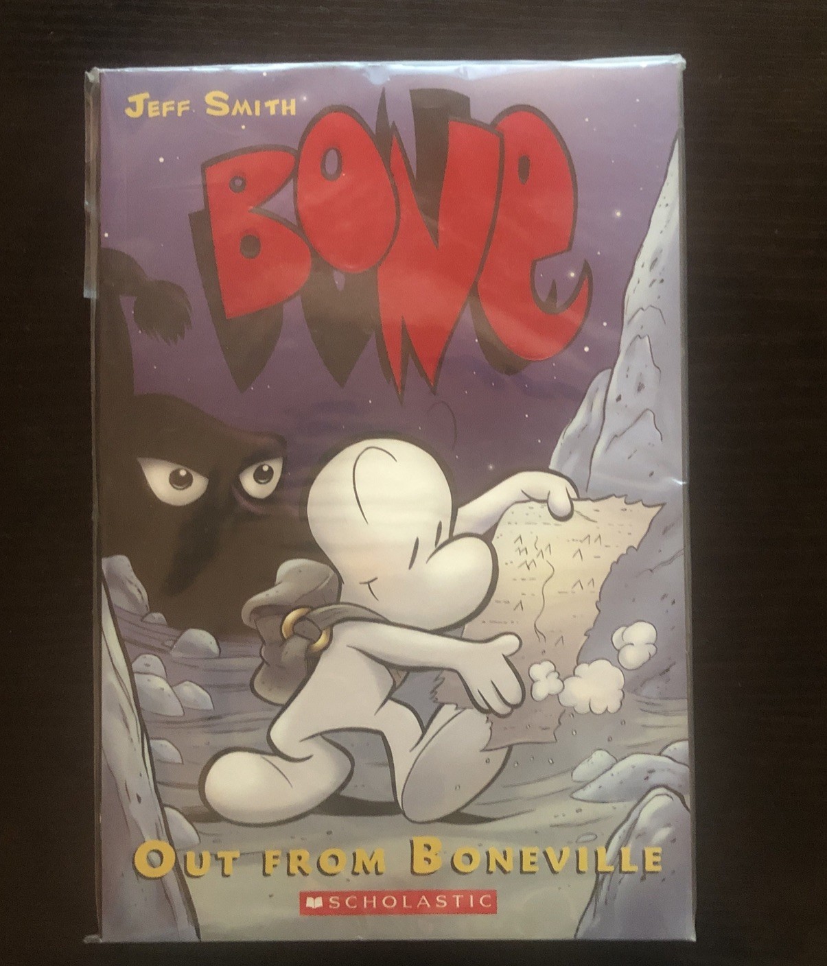 BONE #1: Out from Boneville: a Graphic Novel by Jeff Smith Paperback