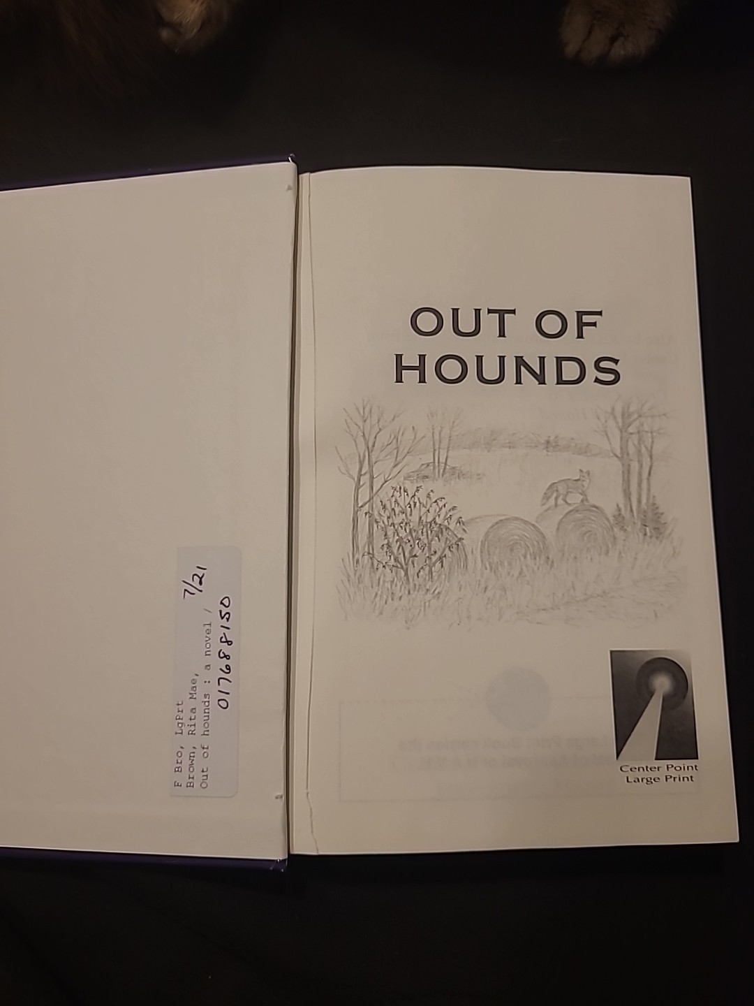 Out of Hounds“ by Rita Mae Brown.