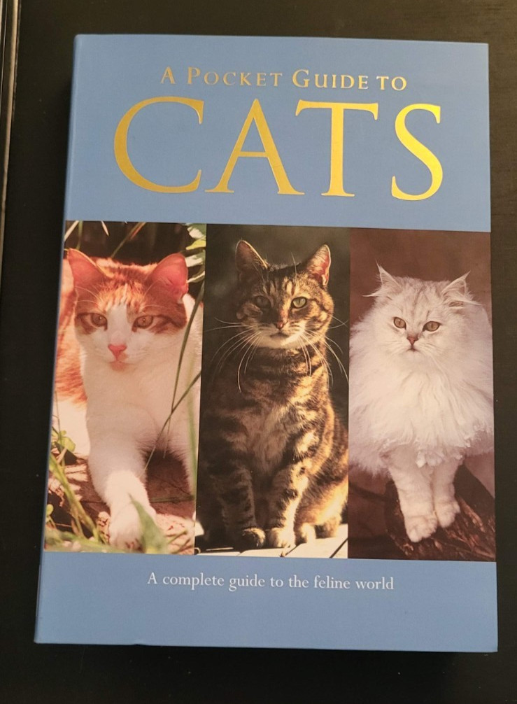 Lot 4 assorted books about cat breeds and facts