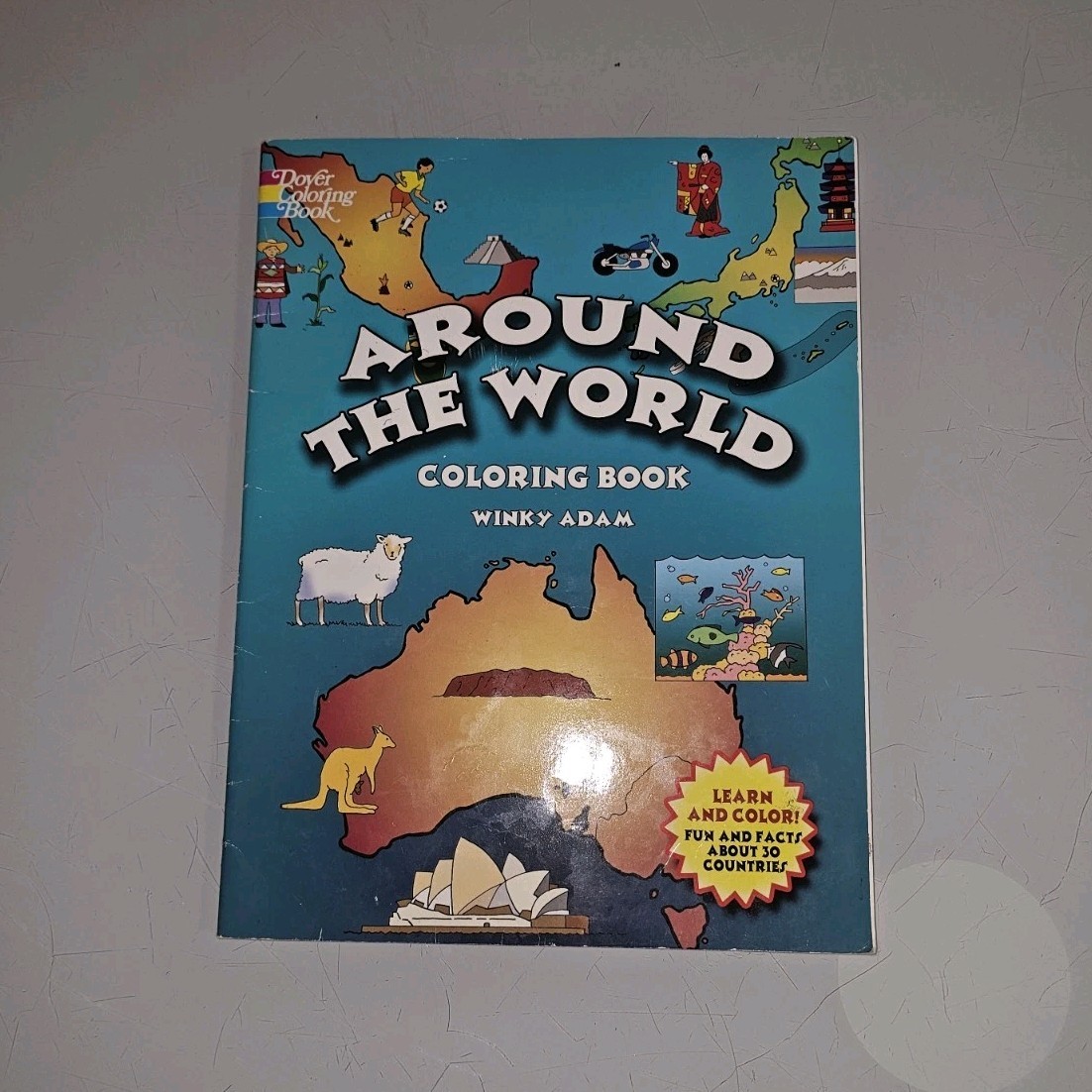 Around the World Coloring Book by Winky Adam, Dover Publications, Paperback