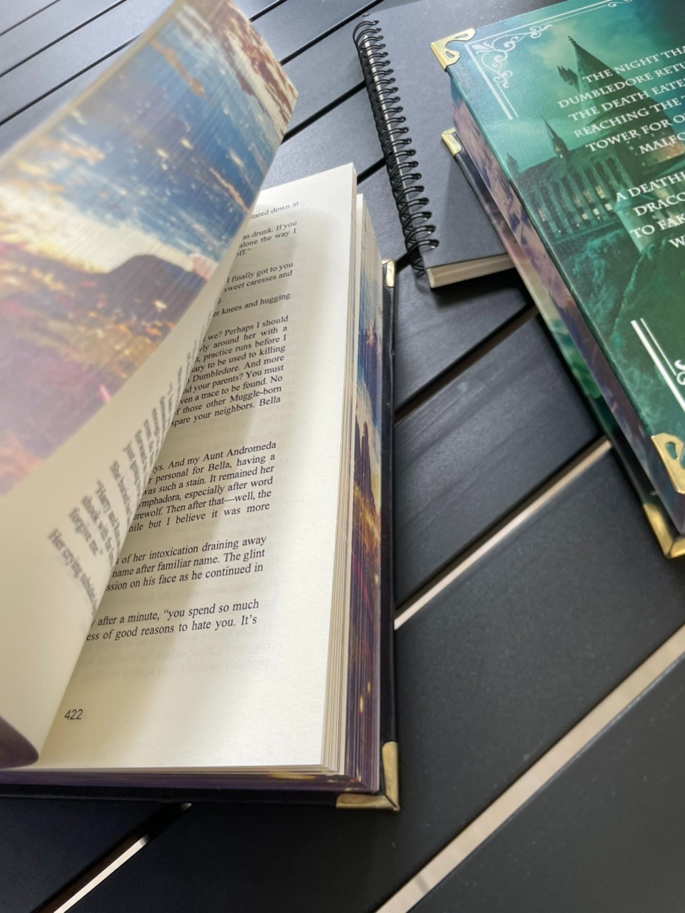 The limited edition hardcover novel Manacled (printed on three sides) collec