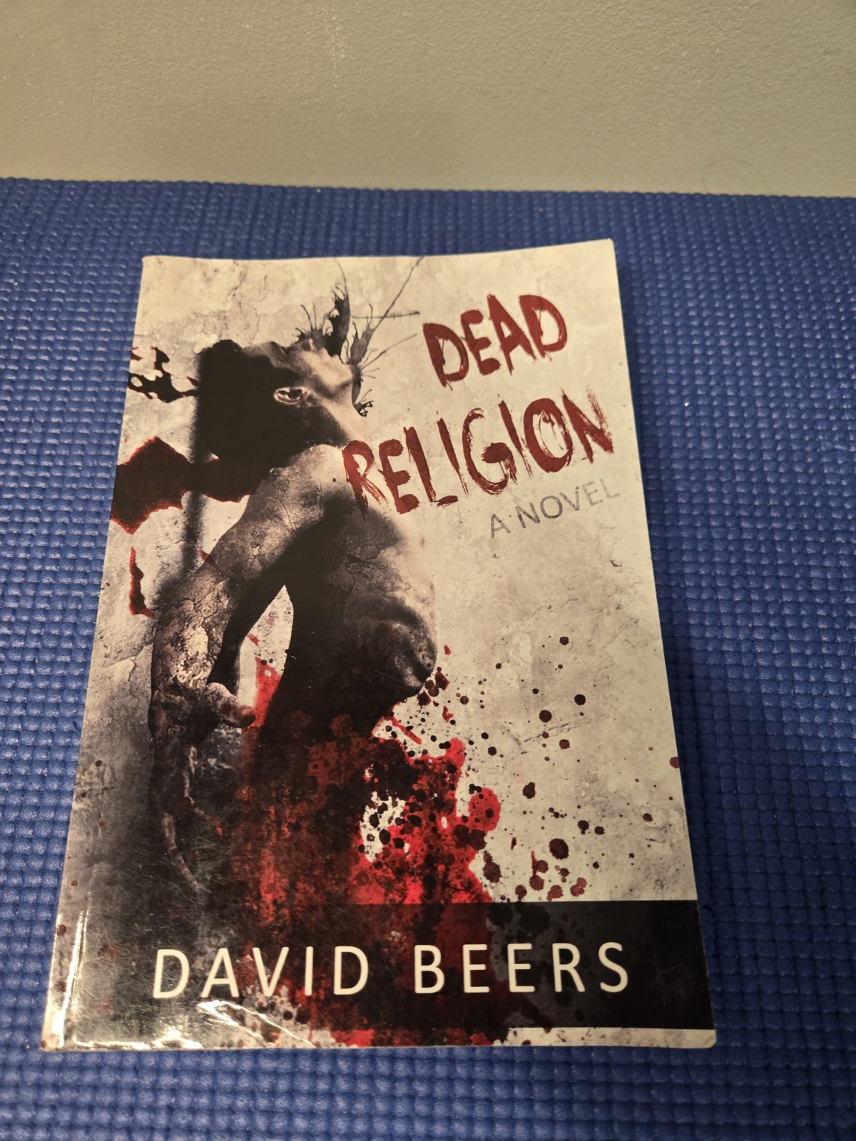 Dead Religion: A Novel by David Beers, a thriller/horror Paperback Book