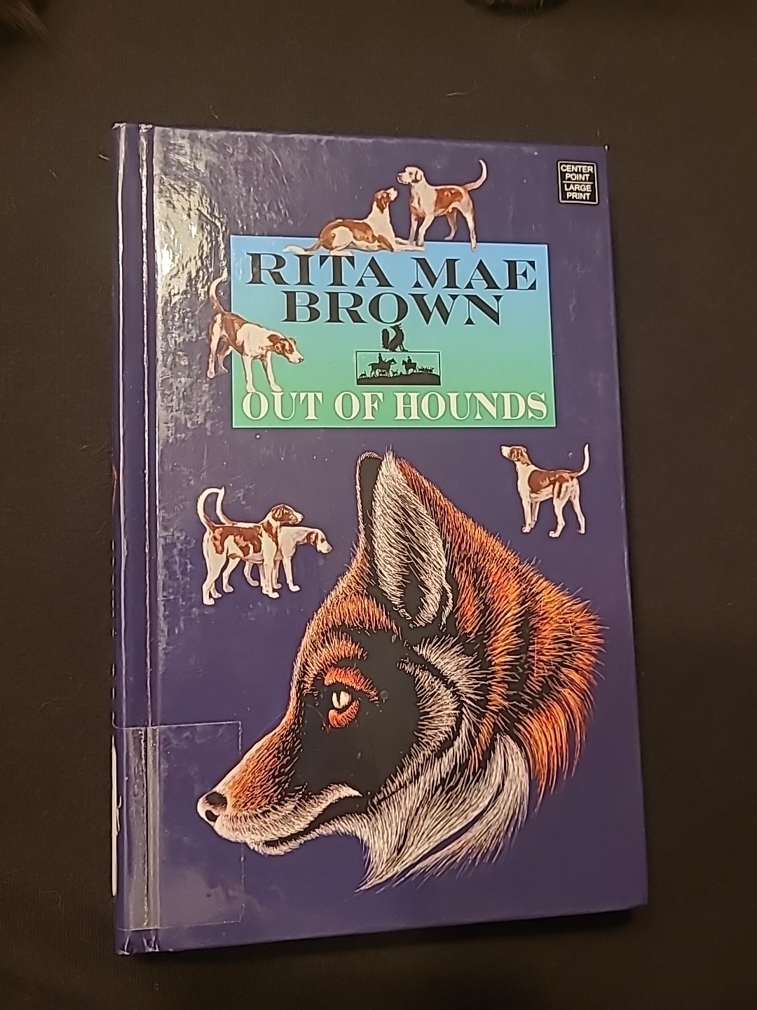 Out of Hounds“ by Rita Mae Brown.