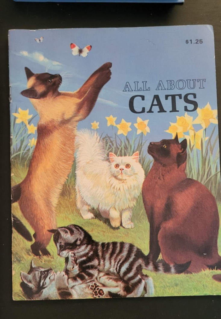 Lot 4 assorted books about cat breeds and facts