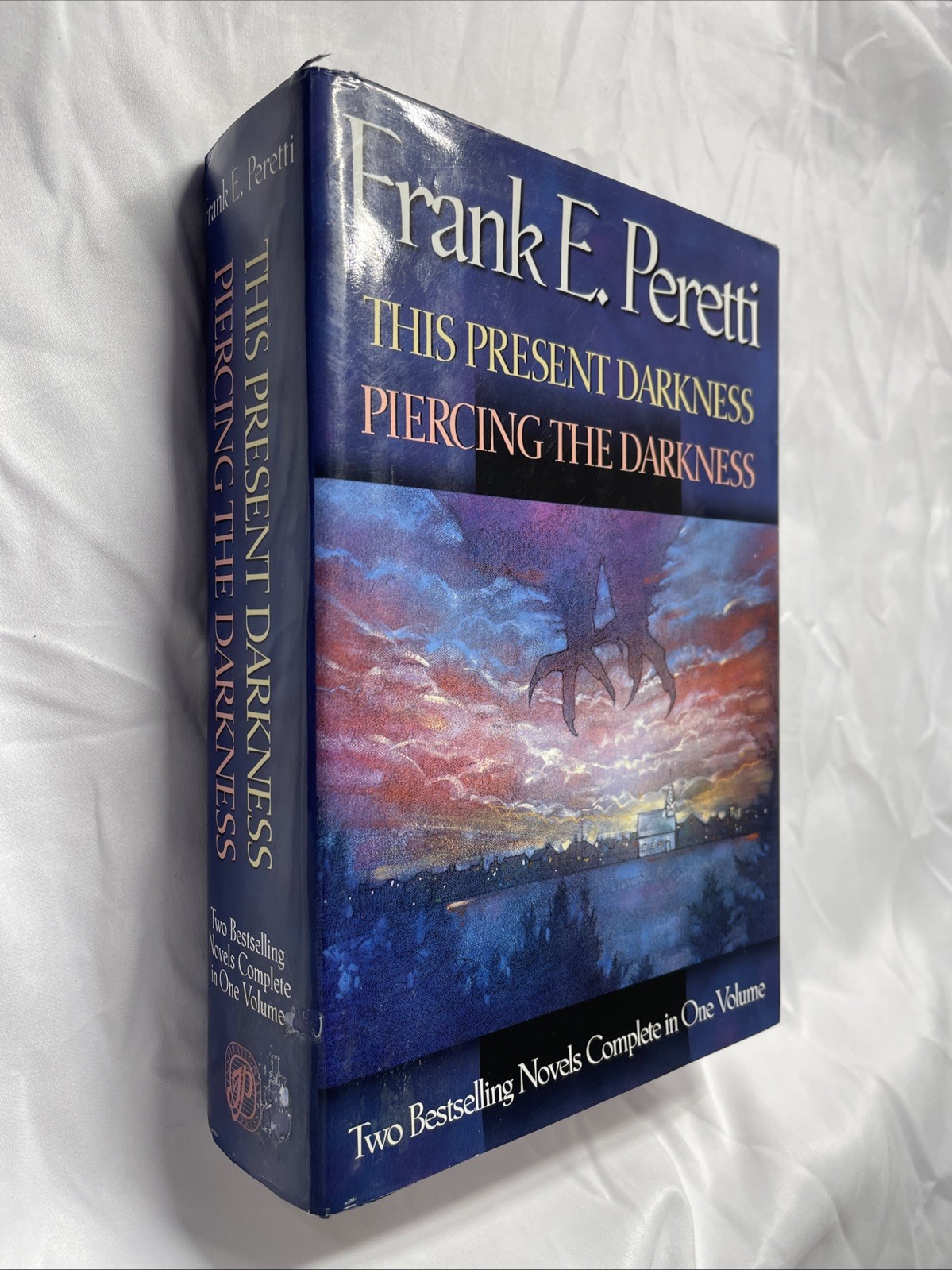 Frank Peretti 2-in-1: This Present Darkness & Piercing the Darkness Hardcover
