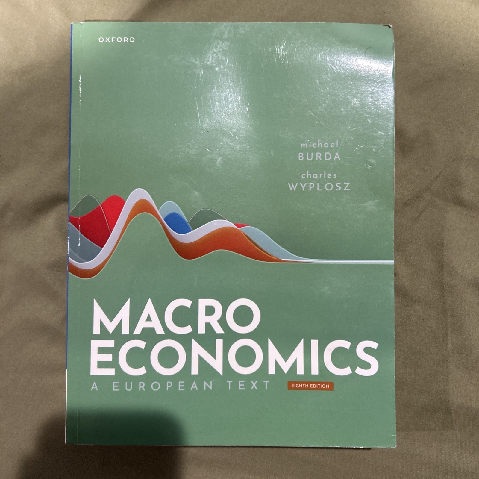 Macroeconomics 8th Edition by Burda: Used