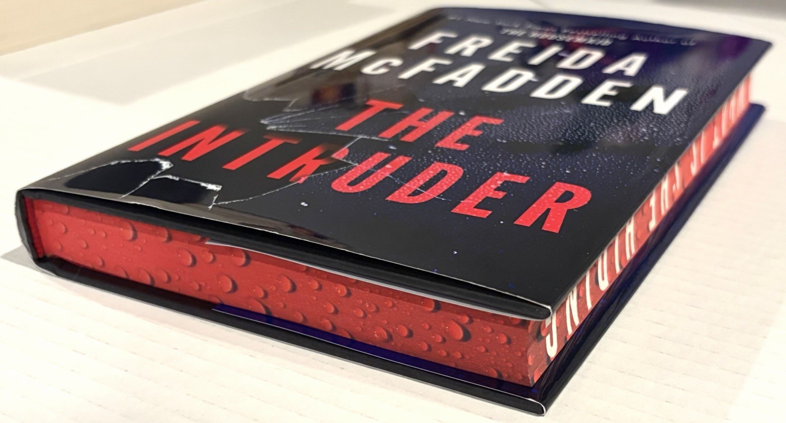 NEW- Deluxe hardcover THE INTRUDER Freida McFadden Sprayed Edges