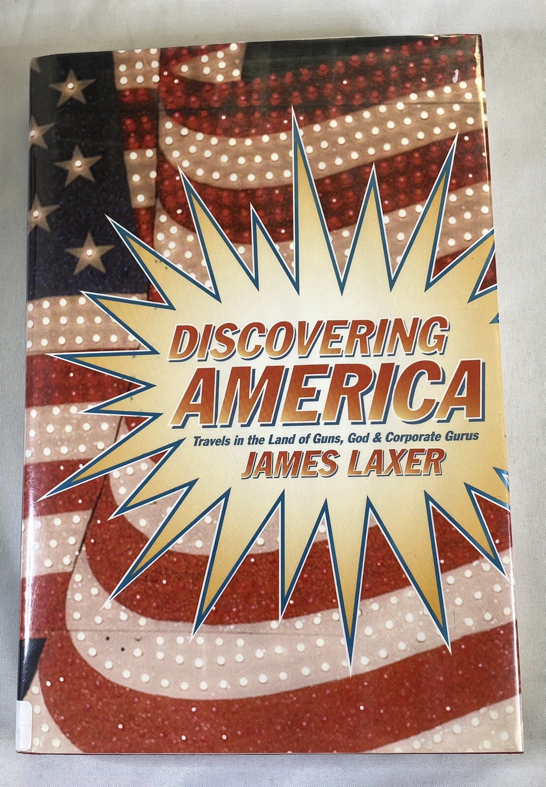 Discovering America : Travels in the Land of Guns, God, and Corporate Guru