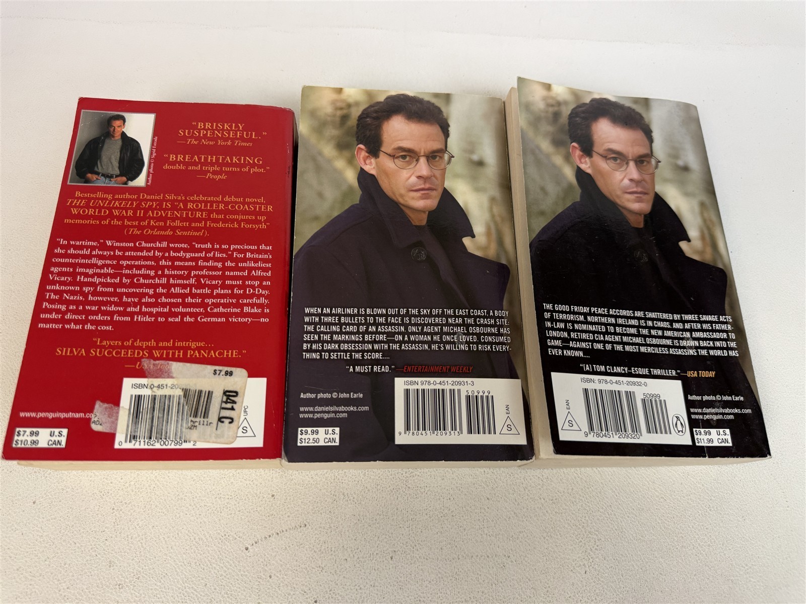 Daniel Silva Lot 22 Paperbacks including 19 Gabriel Allon series
