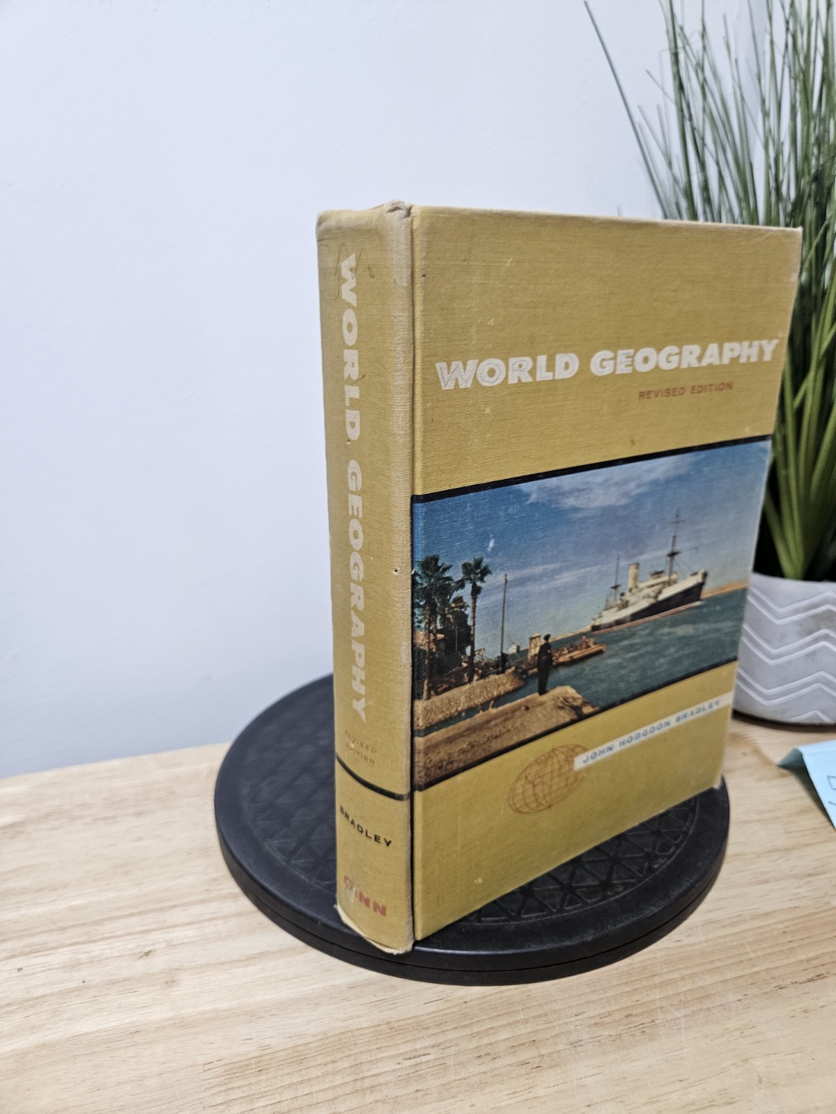 World Geography Revised Edition by John Hodgdon Bradley – Hardcover