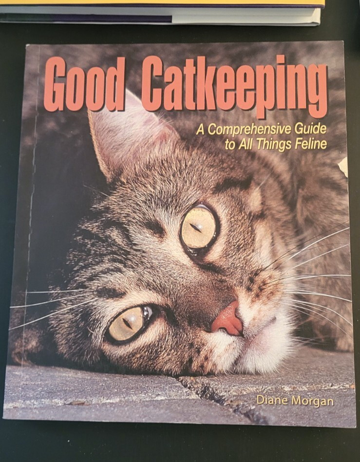 Lot 4 assorted cat care books