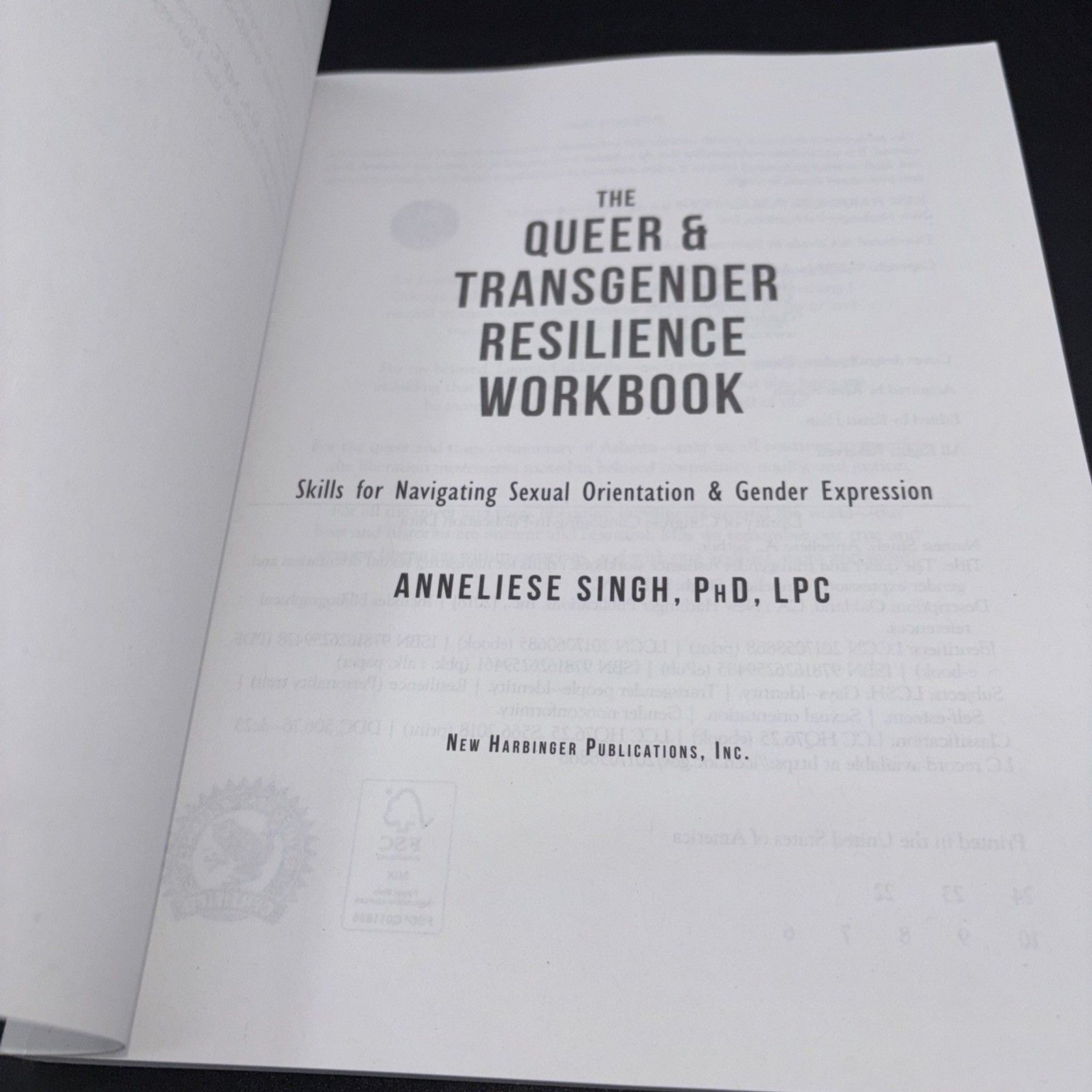 The Queer and Transgender Resilience Workbook : Skills for Navigating Gender