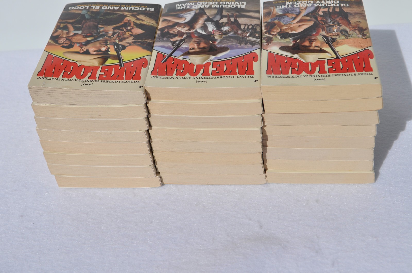 Lot of 24 John Slocum Westerns by Jake Logan-#361 to #393; March 2009-Nov. 2011