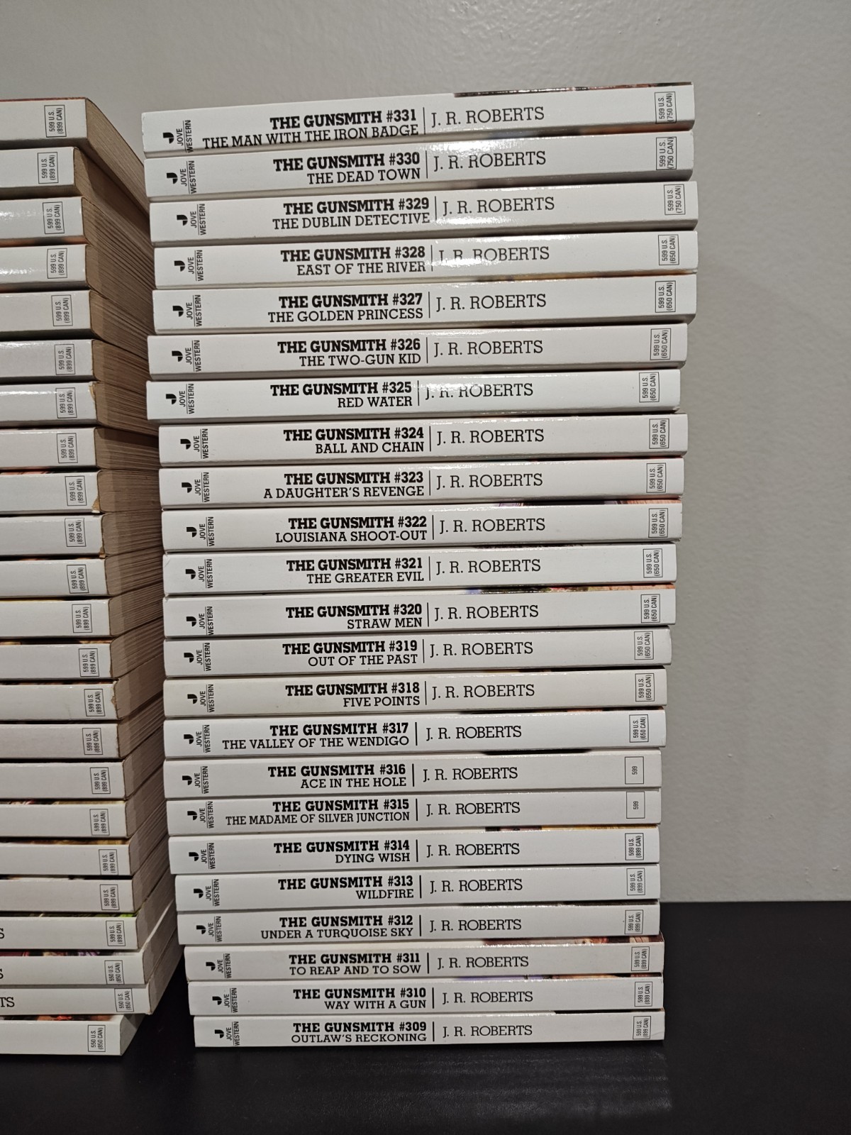 Lot of 50 Vintage The Gunsmith Paperback Books by J. R. Roberts Romance Novel